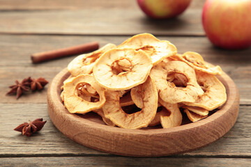 Dried apple chips with cinnamon and star anise with fresh apple. Homemade dried organic apple...
