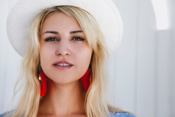 Cheerful female in white clothes on resort terrace