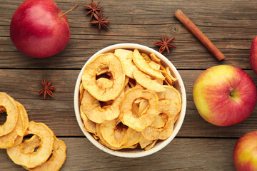 Dried apple chips with cinnamon and star anise with fresh apple. Homemade dried organic apple...