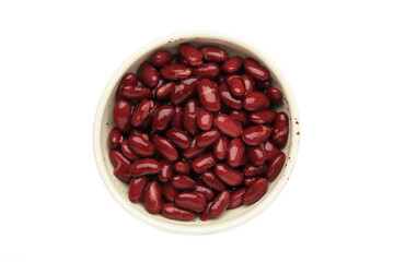 Red beans in bowl isolated on white background.