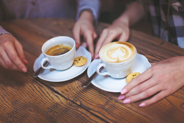 hands with coffee