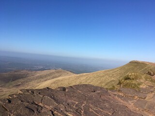 relaxing on the edge of pen y fan mountain