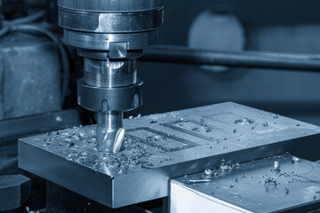 The plunge cutting  process on NC milling machine with flat end mill tools. The metal working...