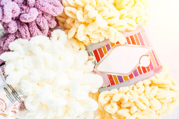 Fluffy yarn. Colored threads in reels. Knitting hobby embroidery