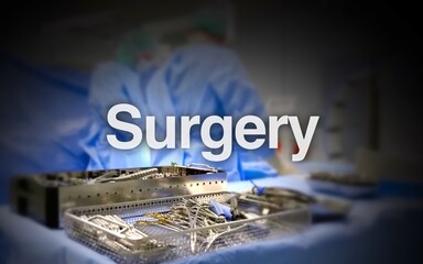 Surgery lettering, in the background an operating room with surgeons on the patient, equipment and...