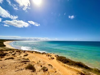 Beach access and coastline between Tarifa and Valdevaqueros with a view along the beach on the...