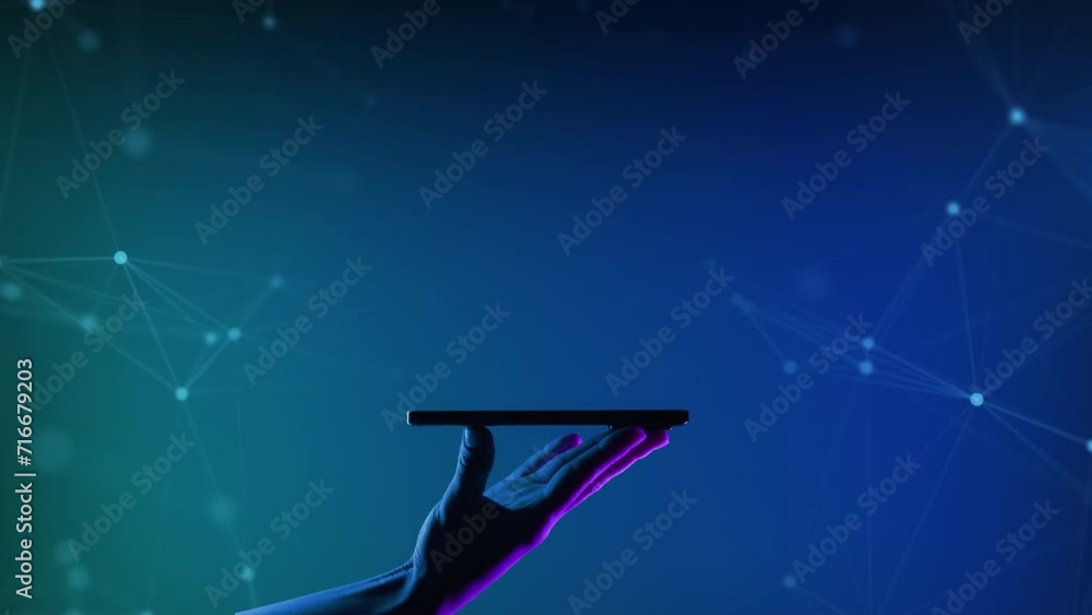 Poster a hand holding smartphone on the neon light background. mobile application or innovation smart app. 