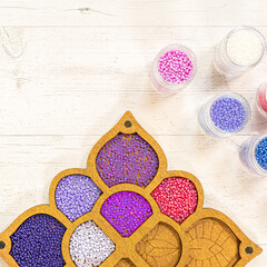 Colorful glass beads. Variety of shapes and colors to make a bead necklace or a string of beads for women