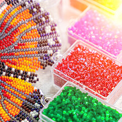 Colorful glass beads. Variety of shapes and colors to make a bead necklace or a string of beads for...