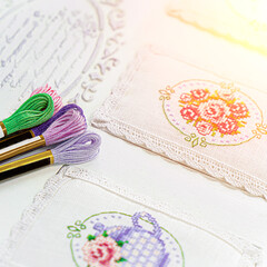 Threads for embroidery. Embroidered picture. Set for beading.