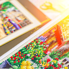 Threads for embroidery. Embroidered picture. Set for beading.