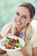 Woman, smile with salad and healthy food for diet, vegetables and lunch with happiness in portrait. Nutrition, wellness and eating vegan meal to lose weight, detox and snack for dinner at home