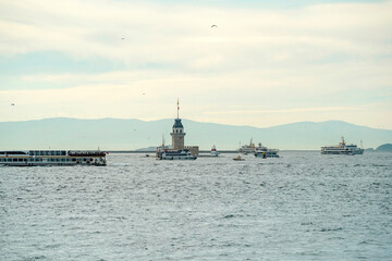 Naklejka premium The pearl of the Bosphorus, the Maiden's Tower (Kız Kulesi) view from Istanbul Bosphorus cruise