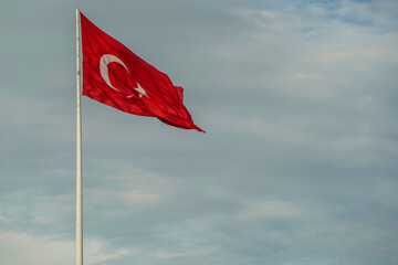Trukish flag in Ortakoy district view from Istanbul Bosphorus cruise