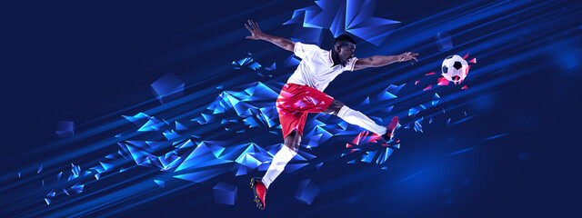 Dynamic image of young African man, football playing in motion, kicking ball in a jump on blue...
