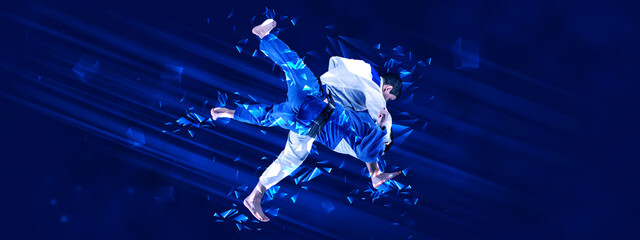 Two men, karate fighters in kimono training on blue background with polygonal and fluid neon...