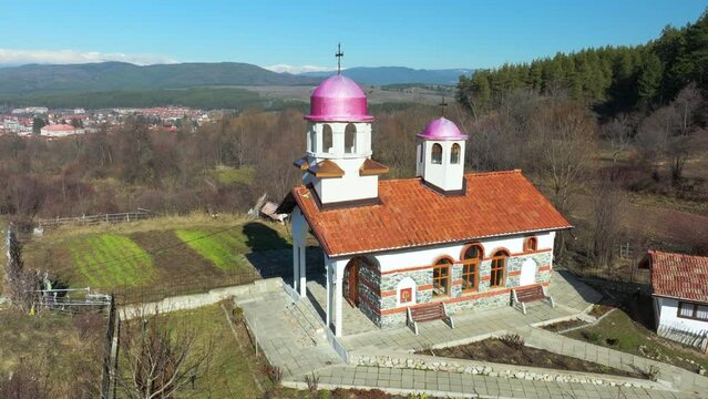 Aerial drone clip, circling around St St Cosmas and Damian Orthodox Chapel near Dobrinishte, Bulgaria.