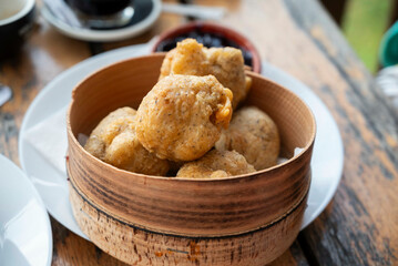 Serbian u&scaron;tipci, doughnut-like fried dough balls popular in Southeast European countries, namely Bosnia and Herzegovina, Croatia, North Macedonia, Serbia and Slovenia, served with Jam