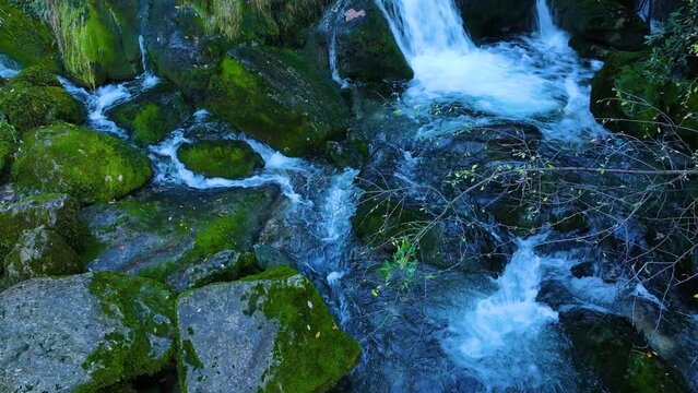 Waterfall and landscape at the source of the Cadagua River in the surroundings of the town of Cadagua in the Mena Valley. Las Merindades region. Province of Burgos. Spain. Europe