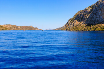 Beautiful nature with sea and mountains. Background with selective focus and copy space