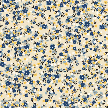 Hand drawn ditsy flowers on a pastel background. Vector seamless pattern