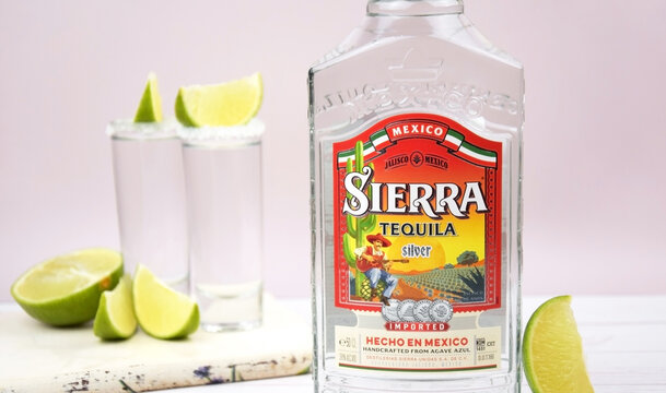 Bottle of Sierra tequila on a light background.