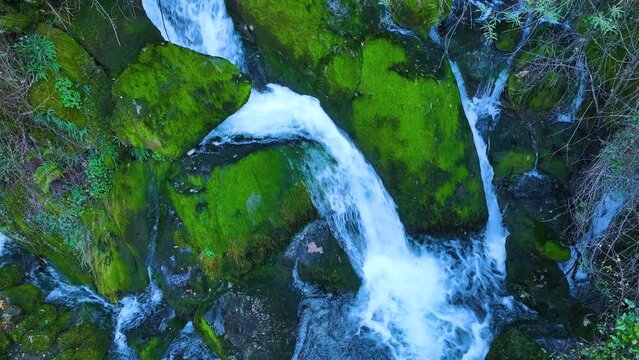 Waterfall and landscape at the source of the Cadagua River in the surroundings of the town of Cadagua in the Mena Valley. Las Merindades region. Province of Burgos. Spain. Europe