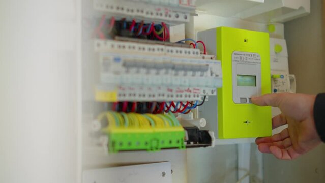 a man saves energy on his electricity bill to reduce his consumption due to the increase in the price