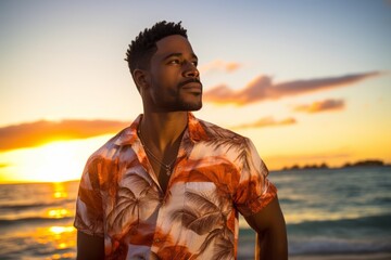 Portrait of a satisfied afro-american man in his 30s donning a trendy cropped top against a stunning sunset beach background. AI Generation - obrazy, fototapety, plakaty