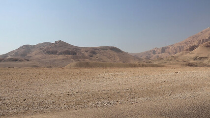 Fototapeta na wymiar Mountain and road to the Temple of Hatshepsut, West Bank of Luxor.
