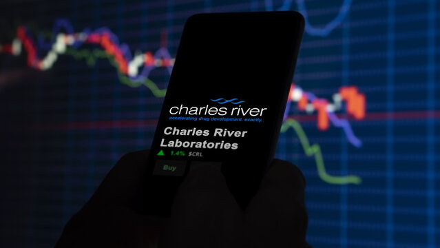 January 15th 2024 Wilmington, Massachusetts. The logo of Charles River Laboratories on the screen of an exchange. Charles River Laboratories price stocks, $CRL on a device.