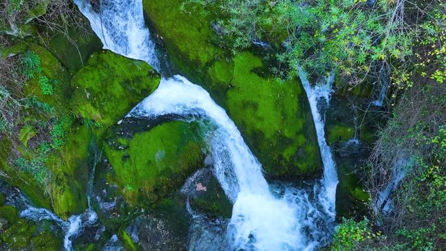 Waterfall and landscape at the source of the Cadagua River in the surroundings of the town of Cadagua in the Mena Valley. Las Merindades region. Province of Burgos. Spain. Europe