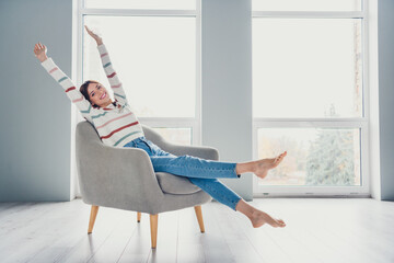 Full length profile portrait of pretty positive person sit comfy chair stretch arms legs sunlight...