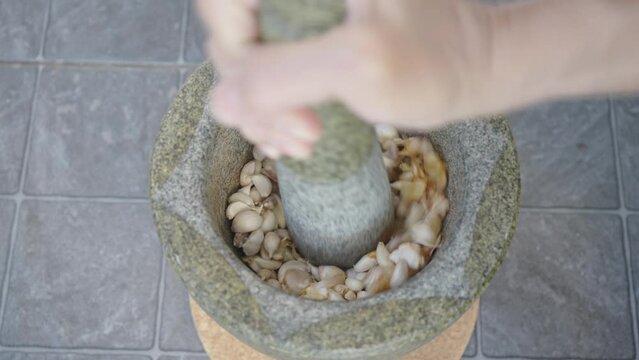 Crushed garlic with mortar