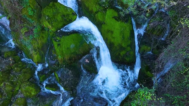Waterfall and landscape at the source of the Cadagua River in the surroundings of the town of Cadagua in the Mena Valley. Las Merindades region. Province of Burgos. Spain. Europe