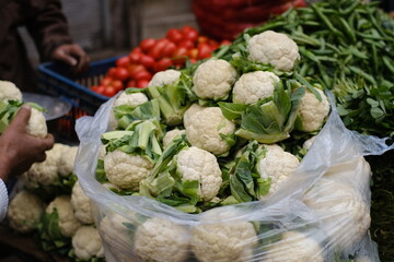 Various of vegetables at the street market in Delhi, India