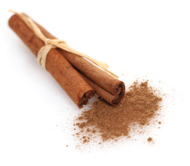 Cinnamon sticks and meal close up