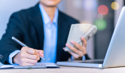 Financial success, and business growth, man's hands holding a dollar bill, increase, wealth, and economic progress, stocks, funds, sales strategy, planning, and big sales Up, exchange rate concept.