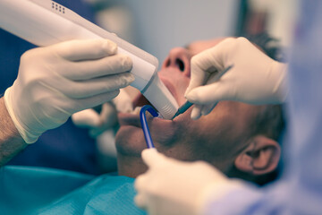 Close up on dentist tools, background is blurred and depth of field is shallow.