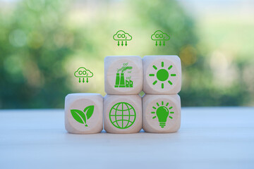 environment Earth concept. Net zero greenhouse gas emissions target. Climate neutral long term strategy. wooden cubes with decarbonization icon and green icon. Green banner.