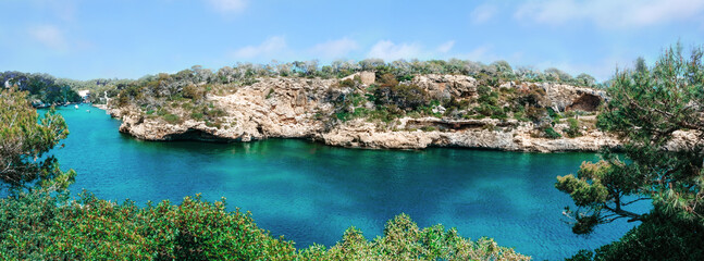Beautiful coast. Banner. View of idyllic  harbor of Cala Figuera, Santanyi Mallorca, Spain. - obrazy, fototapety, plakaty