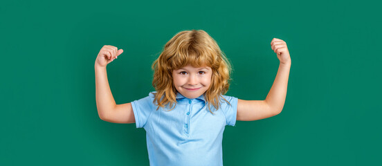 Funny little power super hero kid showing muscles. Strength, confidence or defense from bullying....