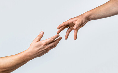 Helping hand outstretched, isolated arm, salvation. Close up help hand. Two hands, helping arm...