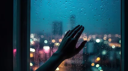 Fotobehang hand touches the window The night view of the city on a rainy night hotel room Generative AI © Tony