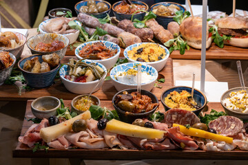 Palermo, Sicily, Italy A display of Italian antipasto dishes on a board.