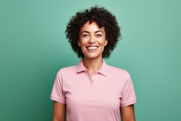 Fototapeta na wymiar Portrait of a smiling afro-american woman in her 30s wearing a sporty polo shirt against a pastel or soft colors background. AI Generation