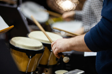 Hands of a musician playing drums