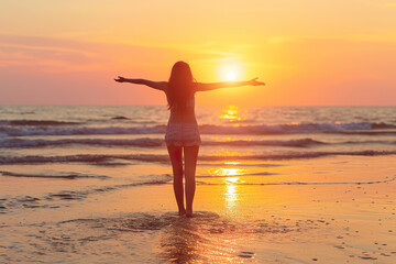 Fototapeta na wymiar A Captivating Image of a Beautiful Woman Embracing the Sunset on the Beach