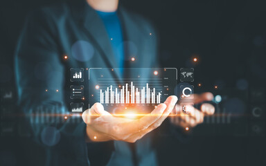 Businessman or Analyst working show financial graph with Business Analytics and Data Management...