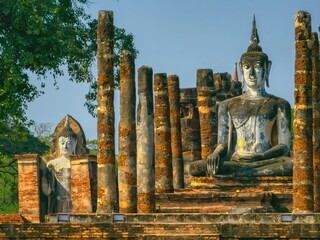 Buddha at Wat Mahathat temple in Sukhothai historical park, UNESCO World Heritage Site, Thailand - 716853437